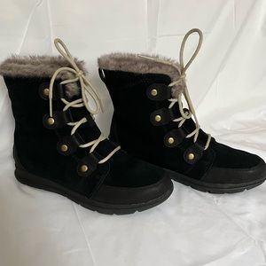 Sorel Women’s suede boots with faux fur trim.